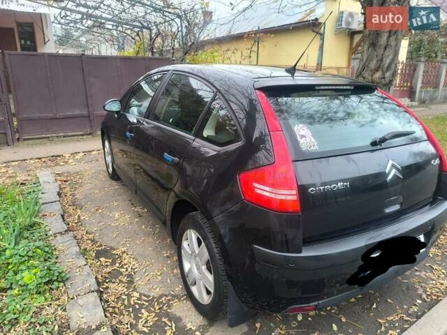 Черный Ситроен С4, объемом двигателя 1.59 л и пробегом 172 тыс. км за 4700 $, фото 2 на Automoto.ua
