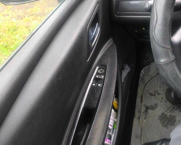 Черный Ситроен С4, объемом двигателя 1.59 л и пробегом 172 тыс. км за 4700 $, фото 5 на Automoto.ua