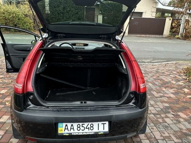 Черный Ситроен С4, объемом двигателя 1.6 л и пробегом 250 тыс. км за 3600 $, фото 17 на Automoto.ua