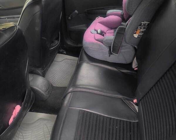 Черный Ситроен С4, объемом двигателя 1.59 л и пробегом 172 тыс. км за 4700 $, фото 1 на Automoto.ua