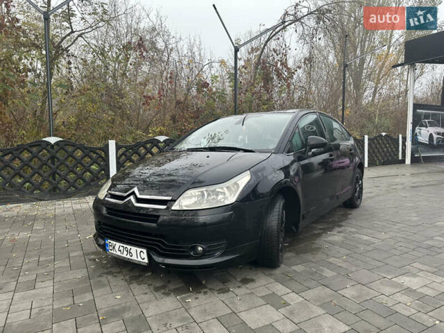 Черный Ситроен С4, объемом двигателя 1.56 л и пробегом 437 тыс. км за 4199 $, фото 1 на Automoto.ua
