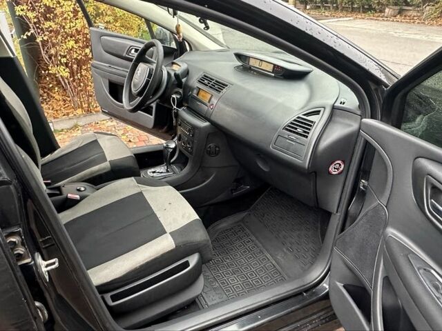 Черный Ситроен С4, объемом двигателя 1.6 л и пробегом 250 тыс. км за 3600 $, фото 19 на Automoto.ua