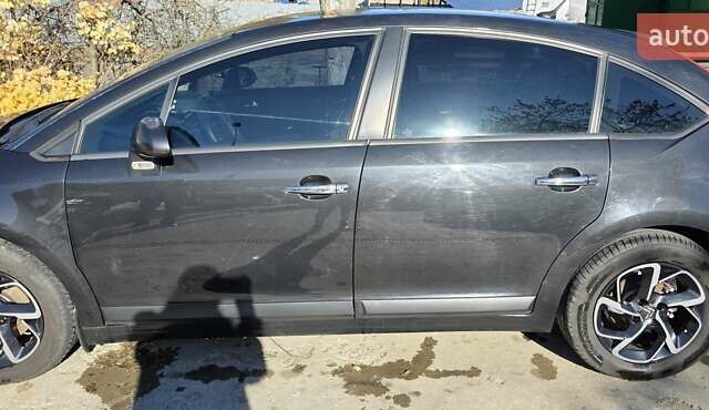 Черный Ситроен С4, объемом двигателя 1.62 л и пробегом 177 тыс. км за 6500 $, фото 1 на Automoto.ua