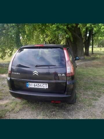 Черный Ситроен С4, объемом двигателя 2 л и пробегом 350 тыс. км за 4700 $, фото 5 на Automoto.ua