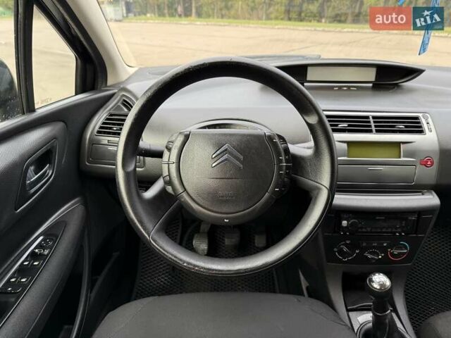 Черный Ситроен С4, объемом двигателя 1.6 л и пробегом 220 тыс. км за 3400 $, фото 50 на Automoto.ua