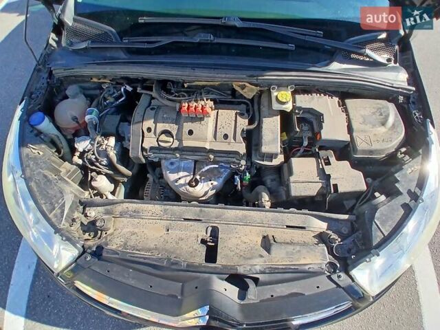Черный Ситроен С4, объемом двигателя 1.59 л и пробегом 175 тыс. км за 7000 $, фото 9 на Automoto.ua