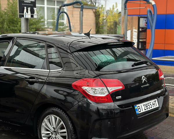 Черный Ситроен С4, объемом двигателя 1.6 л и пробегом 161 тыс. км за 7400 $, фото 5 на Automoto.ua