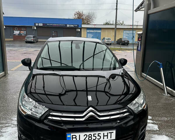 Черный Ситроен С4, объемом двигателя 1.6 л и пробегом 161 тыс. км за 7400 $, фото 2 на Automoto.ua