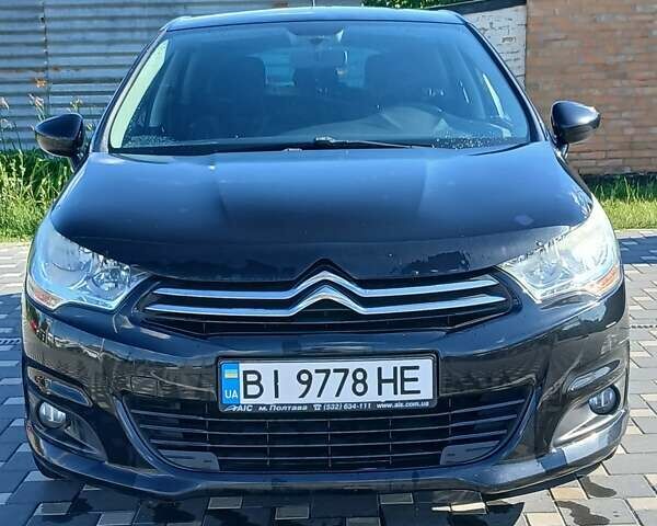 Черный Ситроен С4, объемом двигателя 1.59 л и пробегом 175 тыс. км за 7000 $, фото 2 на Automoto.ua