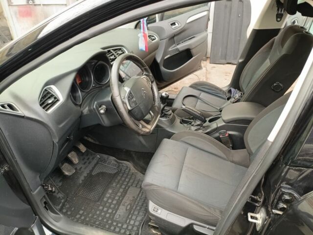 Черный Ситроен С4, объемом двигателя 1.6 л и пробегом 198 тыс. км за 5500 $, фото 7 на Automoto.ua