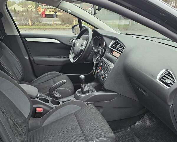 Черный Ситроен С4, объемом двигателя 1.59 л и пробегом 150 тыс. км за 4000 $, фото 25 на Automoto.ua