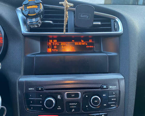 Черный Ситроен С4, объемом двигателя 1.6 л и пробегом 198 тыс. км за 7400 $, фото 9 на Automoto.ua