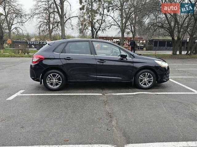 Черный Ситроен С4, объемом двигателя 1.59 л и пробегом 150 тыс. км за 4000 $, фото 5 на Automoto.ua