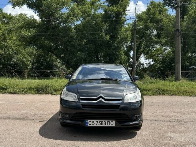 Черный Ситроен С4, объемом двигателя 2 л и пробегом 270 тыс. км за 4100 $, фото 1 на Automoto.ua