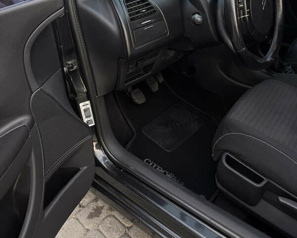 Черный Ситроен С4, объемом двигателя 1.6 л и пробегом 209 тыс. км за 6000 $, фото 19 на Automoto.ua