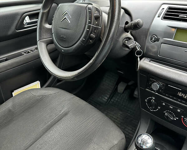 Черный Ситроен С4, объемом двигателя 1.56 л и пробегом 216 тыс. км за 5400 $, фото 18 на Automoto.ua