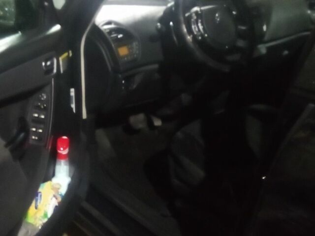 Черный Ситроен С4, объемом двигателя 2 л и пробегом 248 тыс. км за 3950 $, фото 1 на Automoto.ua