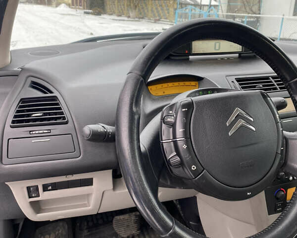 Фиолетовый Ситроен С4, объемом двигателя 1.59 л и пробегом 220 тыс. км за 2000 $, фото 20 на Automoto.ua