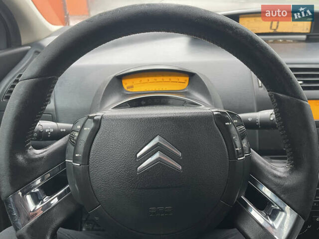 Фиолетовый Ситроен С4, объемом двигателя 1.6 л и пробегом 296 тыс. км за 4400 $, фото 2 на Automoto.ua