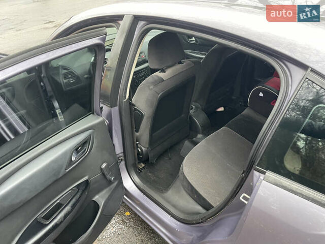 Фиолетовый Ситроен С4, объемом двигателя 1.6 л и пробегом 296 тыс. км за 4400 $, фото 6 на Automoto.ua