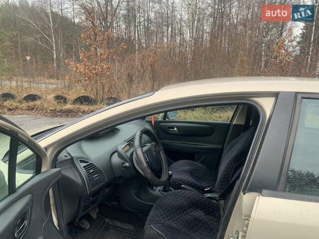 Коричневый Ситроен С4, объемом двигателя 1.58 л и пробегом 260 тыс. км за 3550 $, фото 6 на Automoto.ua