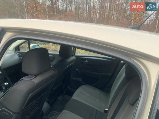 Коричневый Ситроен С4, объемом двигателя 1.58 л и пробегом 260 тыс. км за 3550 $, фото 5 на Automoto.ua