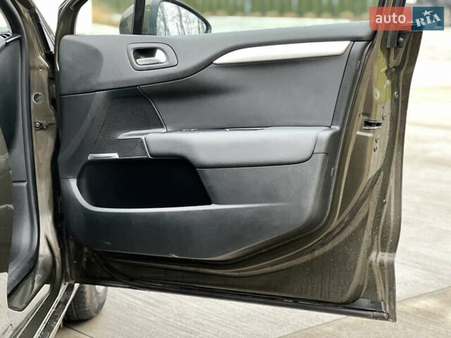 Коричневый Ситроен С4, объемом двигателя 1.56 л и пробегом 255 тыс. км за 7500 $, фото 28 на Automoto.ua