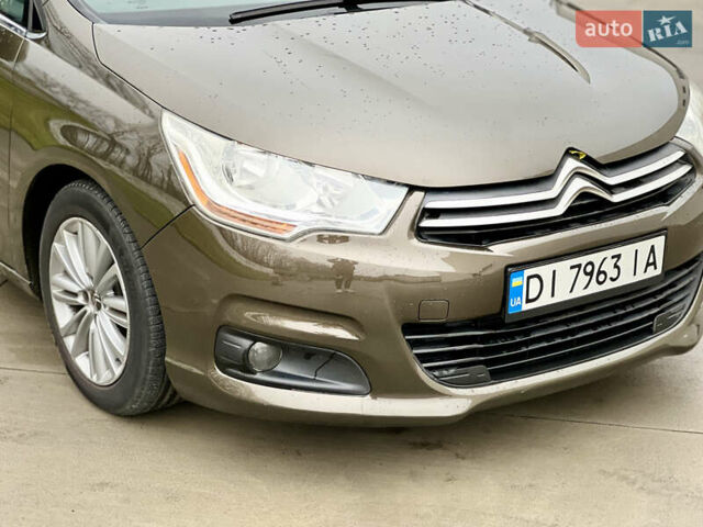 Коричневый Ситроен С4, объемом двигателя 1.56 л и пробегом 255 тыс. км за 7500 $, фото 2 на Automoto.ua