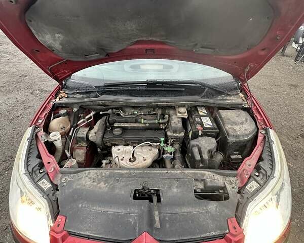 Красный Ситроен С4, объемом двигателя 1.36 л и пробегом 187 тыс. км за 2999 $, фото 32 на Automoto.ua