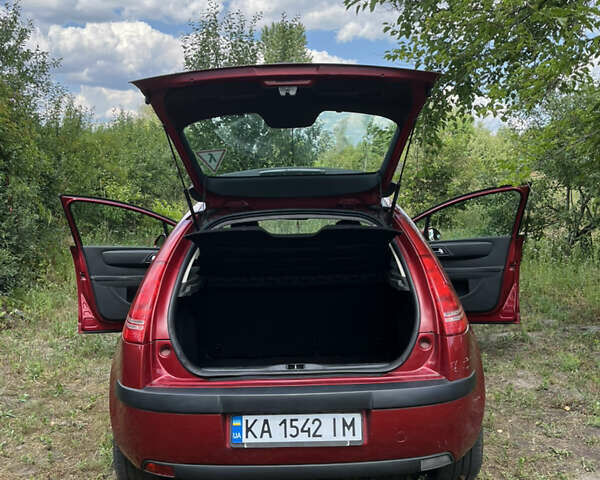 Красный Ситроен С4, объемом двигателя 1.59 л и пробегом 140 тыс. км за 4800 $, фото 8 на Automoto.ua