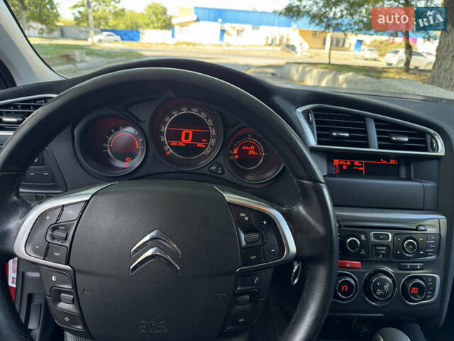Червоний Сітроен С4, об'ємом двигуна 1.6 л та пробігом 202 тис. км за 6999 $, фото 11 на Automoto.ua