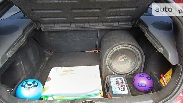 Червоний Сітроен С4, об'ємом двигуна 1.59 л та пробігом 239 тис. км за 3300 $, фото 9 на Automoto.ua