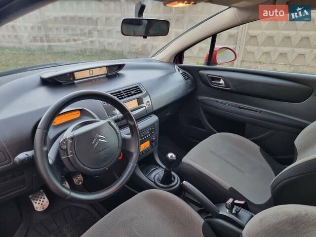 Красный Ситроен С4, объемом двигателя 1.59 л и пробегом 165 тыс. км за 4800 $, фото 18 на Automoto.ua