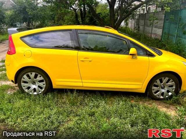 Жовтий Сітроен С4, об'ємом двигуна 2 л та пробігом 270 тис. км за 6000 $, фото 4 на Automoto.ua