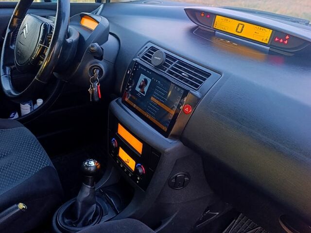 Серый Ситроен С4, объемом двигателя 1.6 л и пробегом 316 тыс. км за 4400 $, фото 10 на Automoto.ua