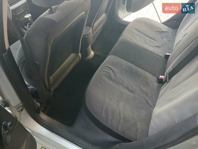 Серый Ситроен С4, объемом двигателя 1.59 л и пробегом 235 тыс. км за 3000 $, фото 16 на Automoto.ua