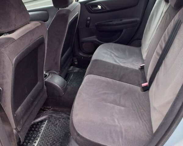 Серый Ситроен С4, объемом двигателя 1.6 л и пробегом 288 тыс. км за 3500 $, фото 14 на Automoto.ua