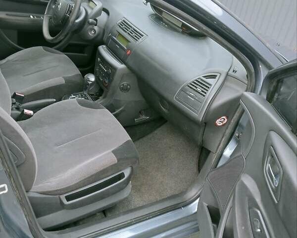 Серый Ситроен С4, объемом двигателя 1.59 л и пробегом 253 тыс. км за 3500 $, фото 12 на Automoto.ua