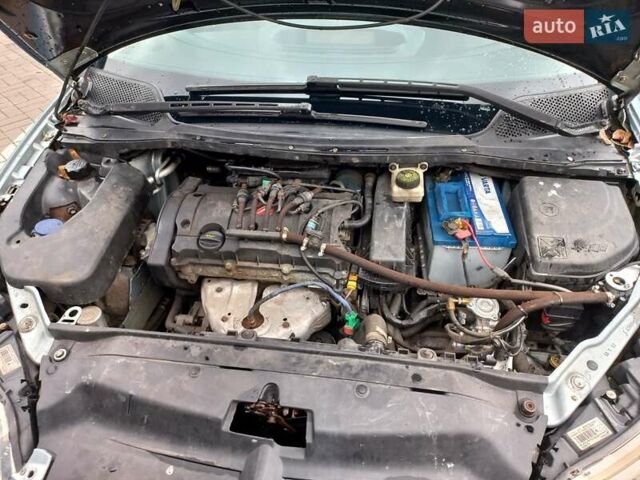 Серый Ситроен С4, объемом двигателя 1.6 л и пробегом 288 тыс. км за 3500 $, фото 11 на Automoto.ua