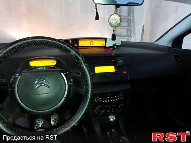 Серый Ситроен С4, объемом двигателя 1.4 л и пробегом 234 тыс. км за 3800 $, фото 6 на Automoto.ua