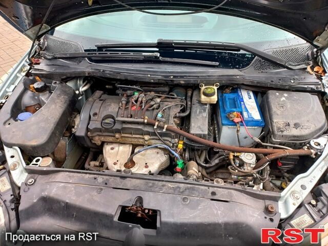 Серый Ситроен С4, объемом двигателя 1.6 л и пробегом 288 тыс. км за 3500 $, фото 6 на Automoto.ua