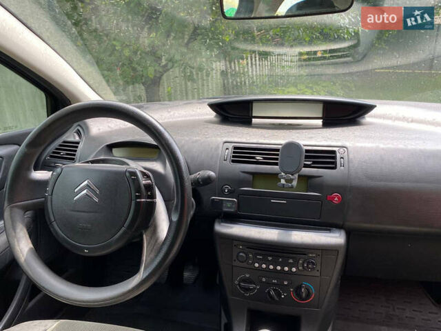 Серый Ситроен С4, объемом двигателя 1.59 л и пробегом 209 тыс. км за 3900 $, фото 11 на Automoto.ua
