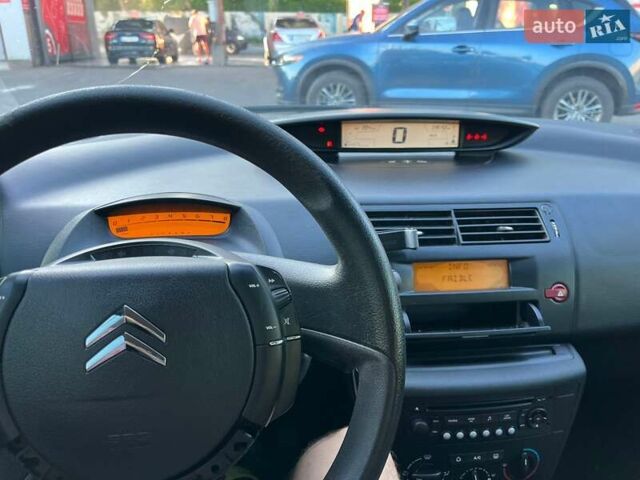 Сірий Сітроен С4, об'ємом двигуна 1.4 л та пробігом 239 тис. км за 5500 $, фото 4 на Automoto.ua