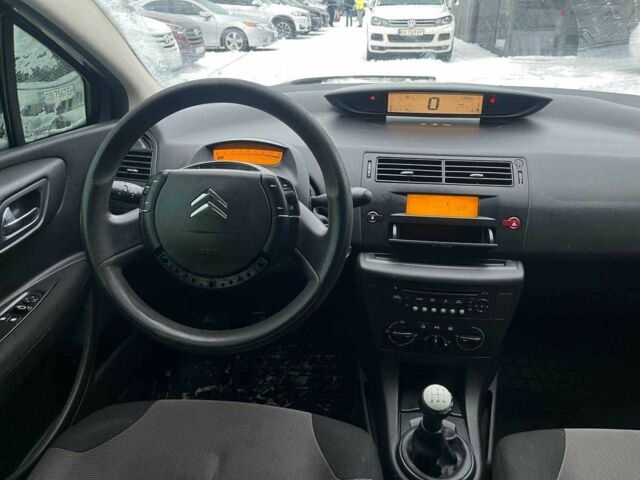 Серый Ситроен С4, объемом двигателя 1.4 л и пробегом 239 тыс. км за 4390 $, фото 12 на Automoto.ua