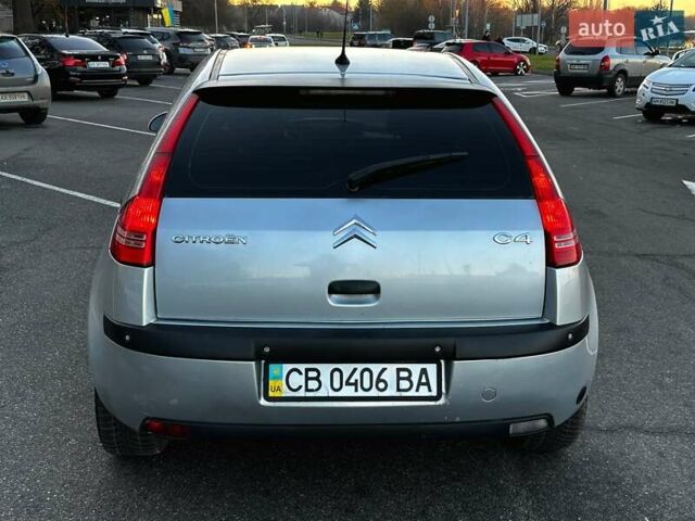 Серый Ситроен С4, объемом двигателя 1.59 л и пробегом 200 тыс. км за 3650 $, фото 1 на Automoto.ua