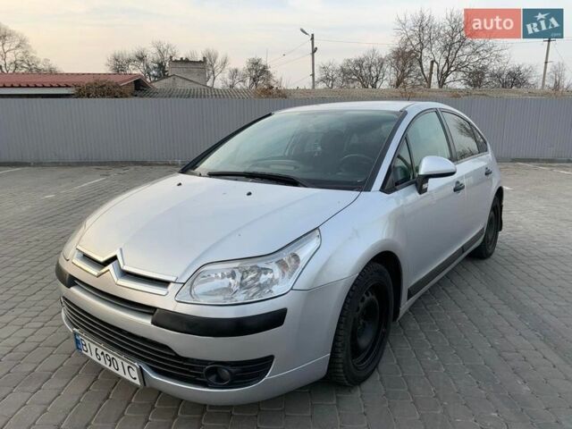 Серый Ситроен С4, объемом двигателя 1.6 л и пробегом 311 тыс. км за 2999 $, фото 1 на Automoto.ua