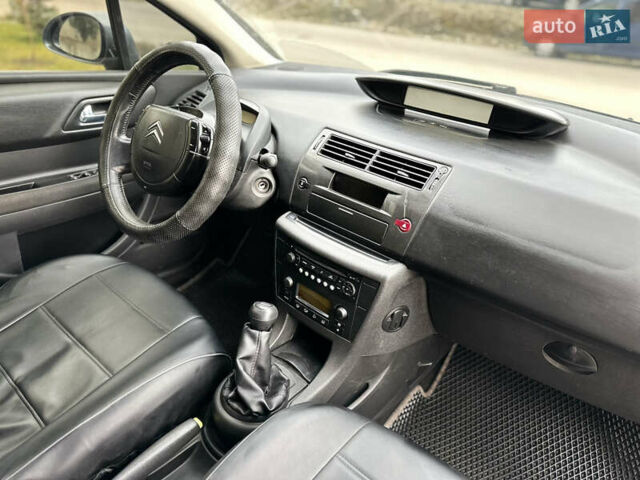 Серый Ситроен С4, объемом двигателя 1.59 л и пробегом 431 тыс. км за 2800 $, фото 37 на Automoto.ua