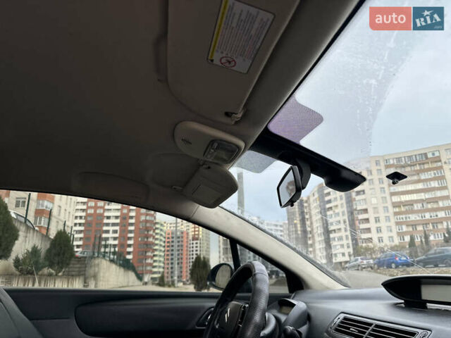 Серый Ситроен С4, объемом двигателя 1.59 л и пробегом 431 тыс. км за 2800 $, фото 34 на Automoto.ua