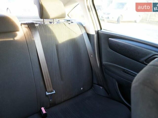 Серый Ситроен С4, объемом двигателя 1.4 л и пробегом 300 тыс. км за 4499 $, фото 14 на Automoto.ua