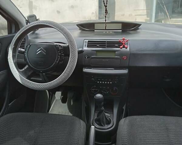 Серый Ситроен С4, объемом двигателя 1.6 л и пробегом 244 тыс. км за 3800 $, фото 7 на Automoto.ua